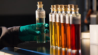 A chemist tests products in a lab.