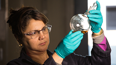 An employee conducts research in one of the labs at the Richmond Technology Center.